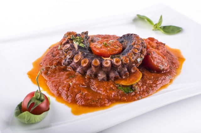 Octopus stewed with chopped tomatoes